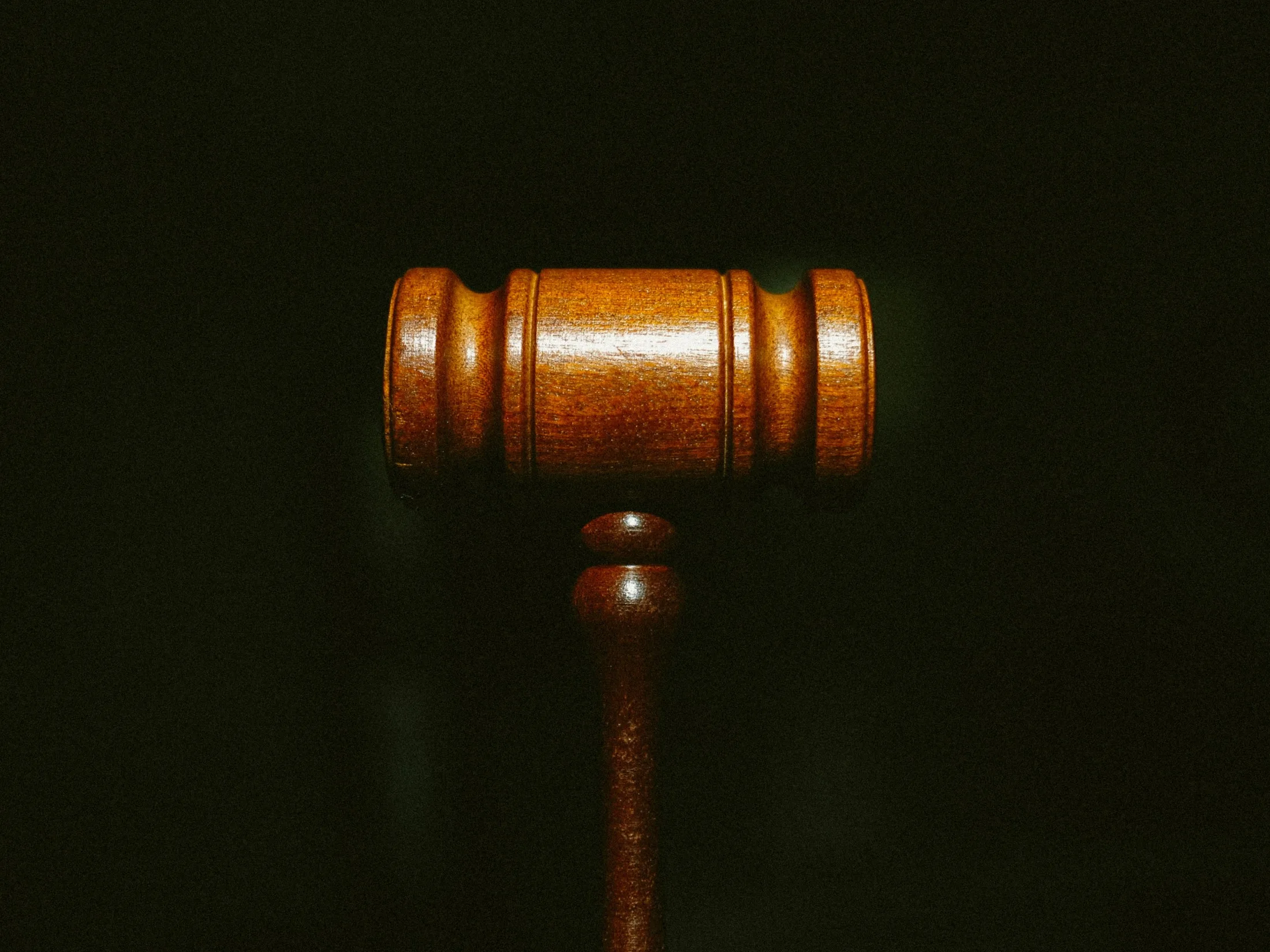 Photo of a gavel as OpenAI launches a legal counteroffensive against one of its co-founders, Elon Musk, and his competing AI venture, xAI.